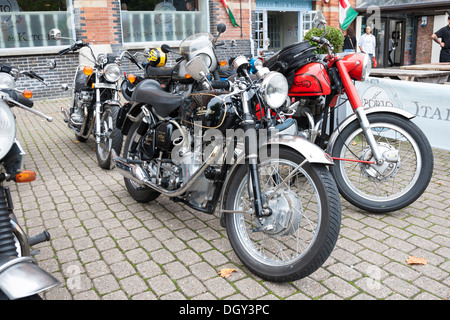 vintage velocette and norton motorcycles on street Stock Photo