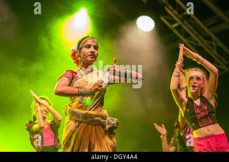 Trafalgar Square, London UK, 27 October 2013.  Diwali is celebrated by Hindu, Sikh and Jain communities across the world between mid-October and mid-November every year.  Diwali, "the festival of lights", celebrates the triumphant victory of good over evil, light over darkness and hope over despair.  A variety of traditional Indian, Bollywood and contemporary dancers drawn from many nationalities took to the stage to showcase the diverse nature of cultural performing arts. © Stephen Chung/Alamy Live News Stock Photo