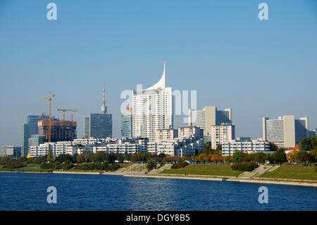 Modern architecture with the Neue Donau high-rise building on the New Danube River, Vienna, Austria, Europe Stock Photo