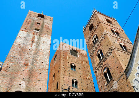Bell tower of San Michele Cathedral and the towers of Torre del Comune and Torre del Municipio, historic town centre, Altstadt Stock Photo