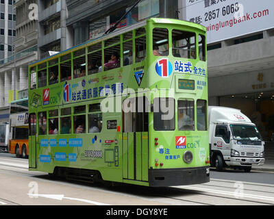 Light-green double-decker tram on Queensroad in Hong Kong, China, Asia Stock Photo