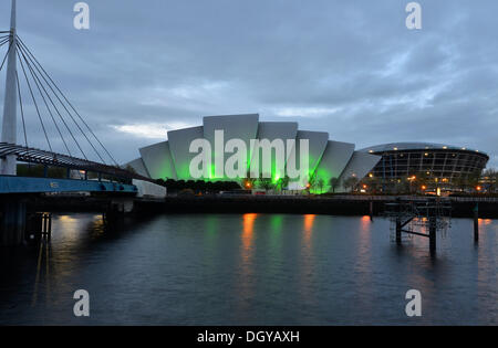 Illuminated Clyde Auditorium with the Bell Bridge and The Hydro arena on the River Clyde, Glasgow, Scotland, United Kingdom Stock Photo