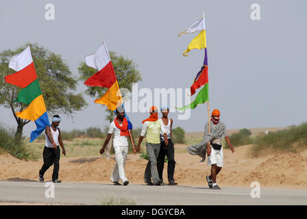 Ram Devra pilgrims, Thar Desert, at Pokaran or Pokhran, Rajasthan, North India, India, Asia Stock Photo