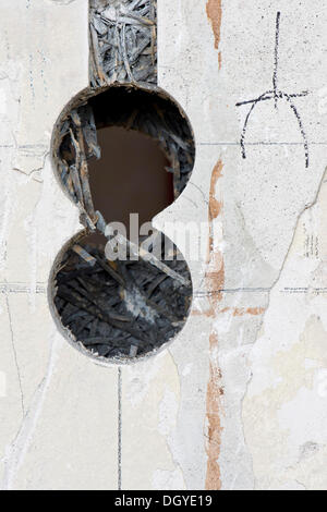 Preparatory work on a wall for installing new cable canals and sockets, electrical wiring in an old building, Stuttgart Stock Photo