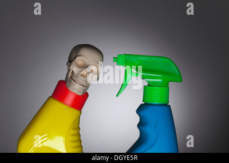 Imaginative confrontation between two toxic spray bottles Stock Photo