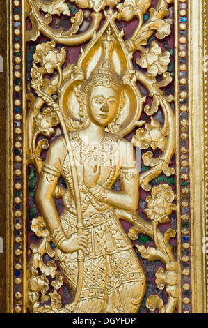 Carved entrance door to Wat Sene Temple, Wat Sensoukharam, Luang Prabang, UNESCO World Heritage Site, Laos, Indochina, Asia Stock Photo