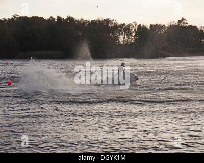 MERE BROW, TARLETON, LANCASHIRE, UK. 27th October 2013. Jet Skiers brave the 40mph winds as St Jude Storm approaches. © Sue Burton/Alamy Live News Stock Photo