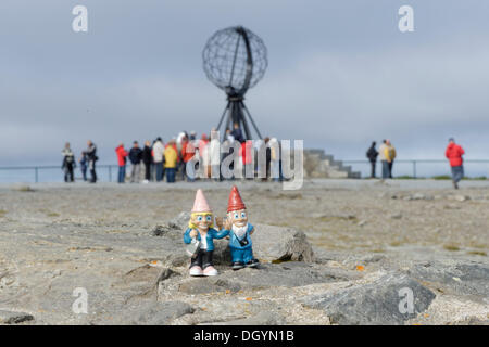 Gnomes in front of the globe on North Cape platform, Nordkapp, Norway Stock Photo
