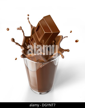 Chocolate cubes splashing into a chocolate milkshake glass. Bird eye view, on white background. Clipping path included. Stock Photo