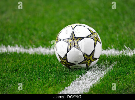 Adidas football lying on a football pitch Stock Photo