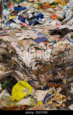 Bales of recyclable plastic containers and paper at a sorting centre, Quebec, Canada Stock Photo