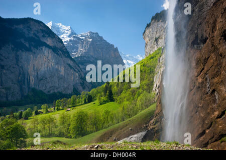 Staubbach Falls near Lauterbrunnen with a view towards the Bernese Alps, Bernese Oberland, Switzerland, Europe Stock Photo