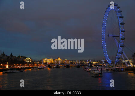 River Thames with the London Eye or Millennium Wheel, seen from Westminster Bridge in the evening, City of Westminster, London Stock Photo