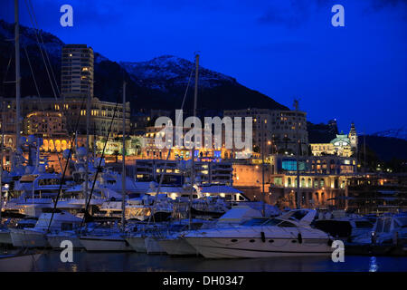 Port Hercule, Monte-Carlo, snow-capped mountains at back, in the evening, dusk, Fürstentum Monaco, Monaco Stock Photo