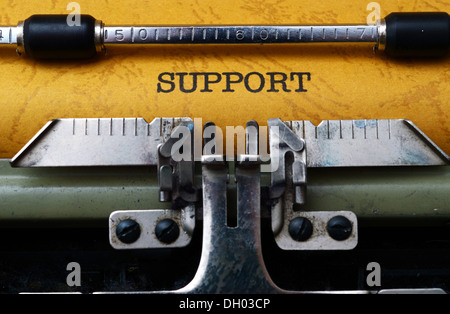 Support text on typing machine Stock Photo