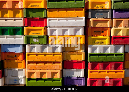 Colourful crates for fish in the port of Maasholm, Schleswig-Holstein Stock Photo