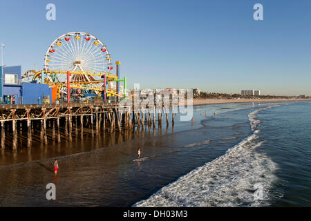 Ferris wheel at Pacific Park on the Santa Monica Pier and the beach in Santa Monica, Santa Monica, Los Angeles County Stock Photo