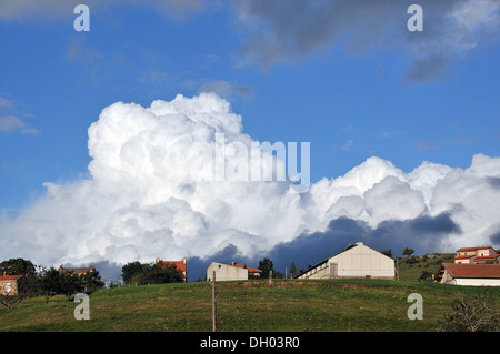 large cloud over village, Puy-de-Dome, Auvergne, Massif-Central, Franc Stock Photo