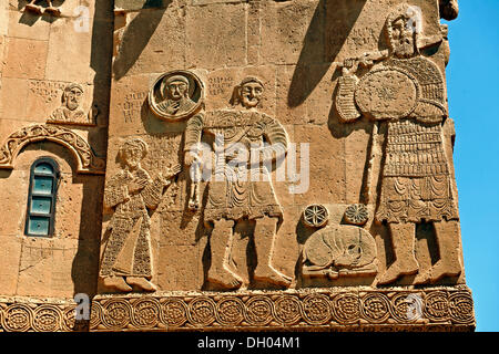 Bas-relief sculptures with scenes from the Bible on the outside of the 10th century Armenian Orthodox Cathedral of the Holy Stock Photo