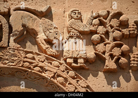 Bas-relief sculptures with scenes from the Bible on the outside of the 10th century Armenian Orthodox Cathedral of the Holy Stock Photo