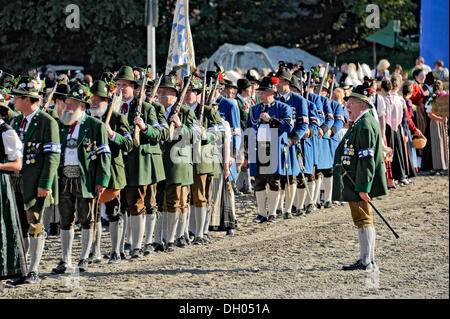 Parade of the gun clubs, members wearing traditional Bavarian costumes, fairground, Oktoberfest festival, Munich, Upper Bavaria Stock Photo