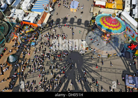 Shadow of the Ferris wheel, chairoplane, Oktoberfest festival, Munich, Upper Bavaria, Bavaria Stock Photo