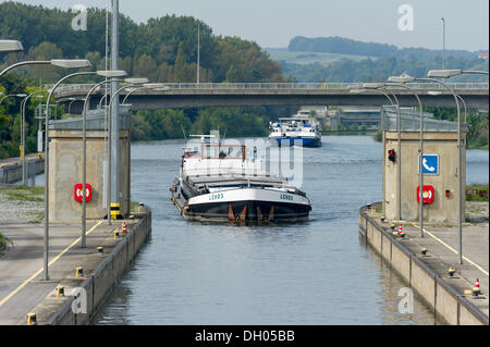 Cargo ship entering a lock, Rhine–Main–Danube Canal, Regensburg, Upper Palatinate, Bavaria Stock Photo