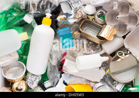 Recycling garbage and reusable waste management as metal, plastic, old paper products to be reused Stock Photo