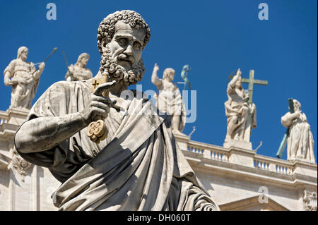 Monumental statue of Saint Peter the Apostle in front of Saint Peter's Basilica, Piazza San Pietro, Saint Peter's Square Stock Photo