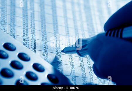 Pen marking stock prices, financial markets, stock exchange Stock Photo