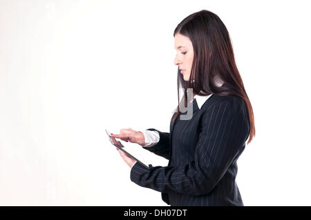 Businesswoman using a tablet PC Stock Photo