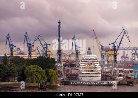 Ship in the dock of the Blohm + Voss shipyard in Hamburg Stock Photo