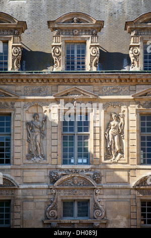 Architectural details on Hotel de Sully in the Marais District, Paris France Stock Photo