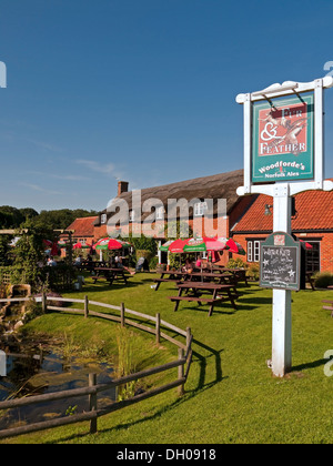 The Thatched Fur and Feather Inn at Woodbastwick in Norfolk, home of Woodfordes Brewery Stock Photo