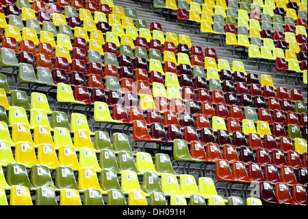 Empty stadium colored seats with numbers on them Stock Photo