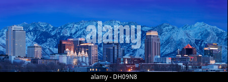 Panoramic view of Salt Lake City at twilight with the Wasatch Mountains beyond, Utah USA Stock Photo