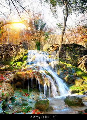 Autumn waterfall in the mountains of Crimea Stock Photo
