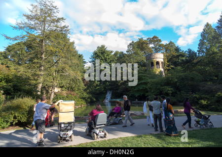 disabled persons in electric wheelchairs at Longwood Gardens, Kennett Square, Pennsylvania, USA Stock Photo