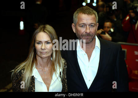 LONDON, ENGLAND - OCTOBER 28: Sean Pertwee and Jacqui Hamilton-Smith attend the UK premiere of 'Dom Hemingway' at The Curzon Mayfair on October 28, 2013 in London, England. Credit:  See Li/Alamy Live News Stock Photo