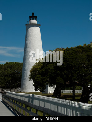 Ocracoke Island Lighthouse against a deep blue sky. Stock Photo