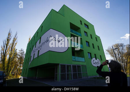 Hamburg, Germany. 24th Oct, 2013. The word 'photosynthesis?' is written on the facade of the 'Algae house' on the grounds of the International Building Exhibition (IBA) in Hamburg, Germany, 24 October 2013. Photo: Maja Hitij/dpa/Alamy Live News Stock Photo