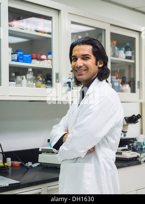 Indian scientist working in laboratory Stock Photo