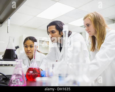 Scientists working in laboratory Stock Photo