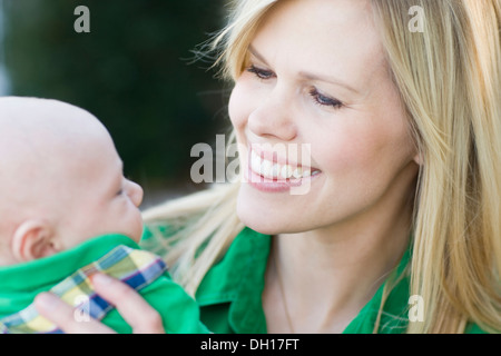 Caucasian mother holding baby Stock Photo