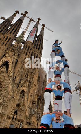 Castellers de Poble-sec.'Castellers' building human tower, De la Marina Street. Barcelona, Spain Stock Photo