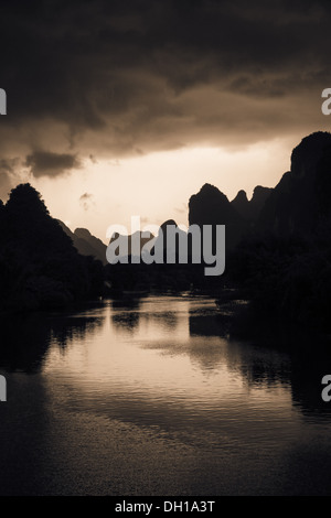 Storm approaching Yangshuo over karst peaks in south China Stock Photo