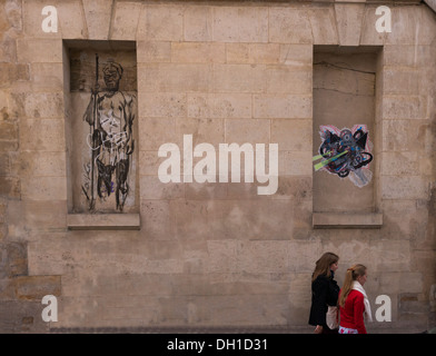 Drawing graffiti in Paris, France Stock Photo