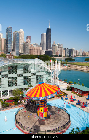 A view of the Wave Swinger and the Chicago skyline as seen from the Navy Pier Ferris Wheel at Pier Park, Navy Pier, Chicago. Stock Photo