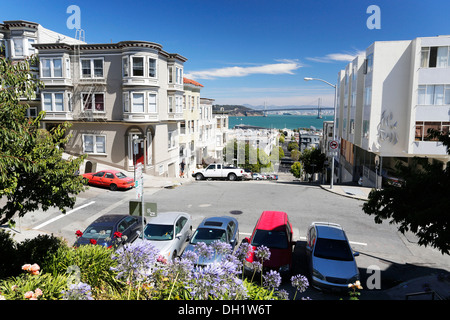 Telegraph Hill district with a view towards Bay Bridge, San Francisco, California, USA Stock Photo