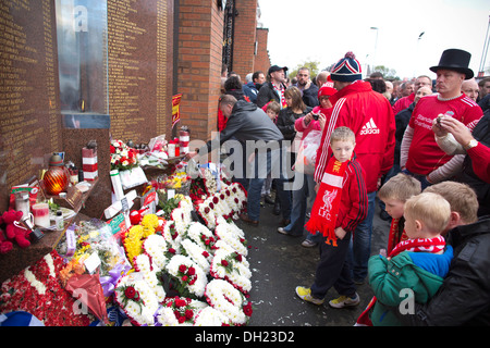 Beside the Shankly Gates at Anfield stands the memorial stone to the Liverpool supporters killed at Hillsborough in 1989. Stock Photo